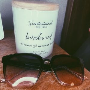 Black and pink hinted glasses, ombré tint through lenses.